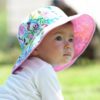 Chapeau de soleil anti-UV spf upf 50+ bébé enfant baby banz réversible évolutif réglable fleurs rose blanc imprimé mignon fille garçon